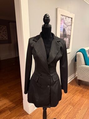 Black long sleeve mini dress.
